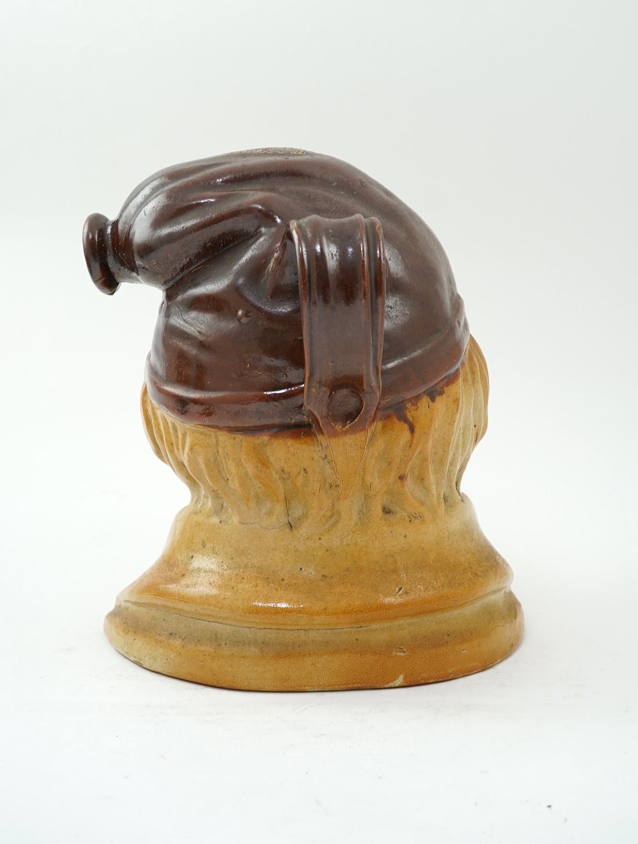 A large 19th century Johnny Souter, salt glazed stoneware spirit flask impressed T A Moss wine and spirit Merchant Bell Mount street Grosvenor square, 28cm high